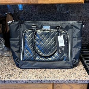 Black Quilted Overnight Bag
By Nicole Miller.  NWT